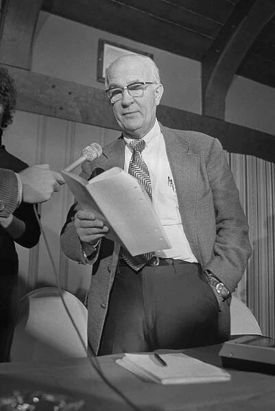 William Shockley Speaking to Newsmen with Notes in Hand