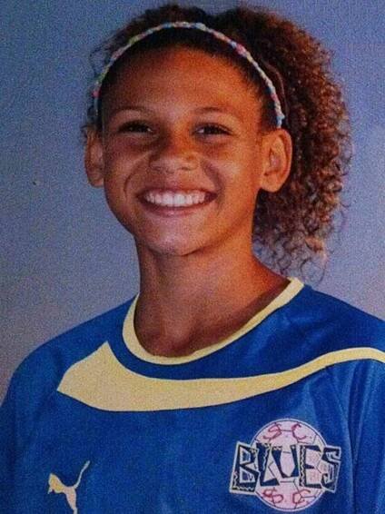 Trinity Rodman smiling