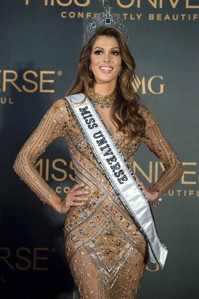 The new Miss Universe Iris Mittenaere of France poses for photographers during a press conference after being crowned the winner at the Miss Universe pageant at the Mall of Asia Arena in Manila on January 30, 2017. France was crowned Miss Universe on January 30 in a glitzy spectacle free of last year's dramatic mix-up but with a dash of political controversy as finalists touched on migration and other hot-button global issues. / AFP PHOTO / NOEL CELIS