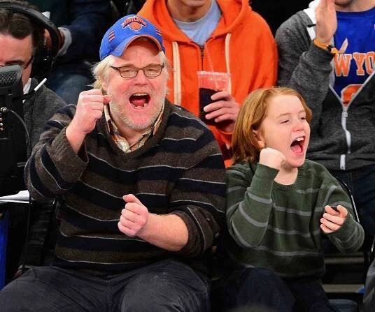NEW YORK, NY - JANUARY 01: Philip Seymour Hoffman and Cooper Alexander Hoffman attend the Portland Trail Blazers vs New York Knicks game at Madison Square Garden on January 1, 2013 in New York City. (Photo by James Devaney/FilmMagic)