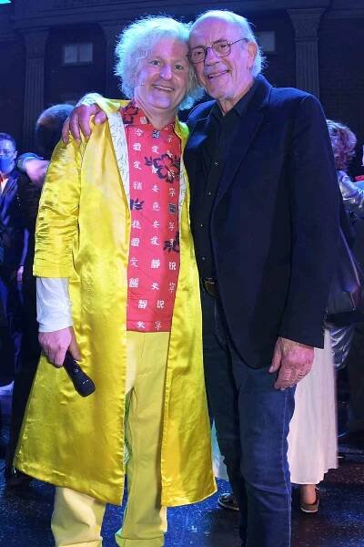 Cast members Mark Oxtoby and Christopher Lloyd bow at the curtain call during the opening night performance of "Back To The Future: The Musical" at The Adelphi Theatre on September 13, 2021 in London, England.
