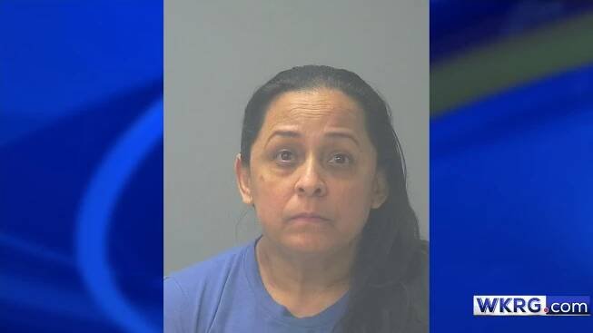 Maria Victoria Borja-Avila mugshot (Courtesy of the Santa Rosa County Sheriff's Office), placed on a blue background with the WKRG.com logo