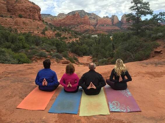 yoga hiking in sedona prayer behind back