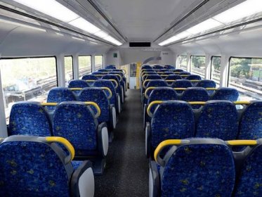 The inside of a Sydney Transport Waratah train carriage