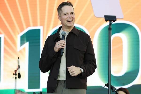 Jason Kennedy speaks on stage during the the University of Miami celebrates Centennial with a concert featuring 