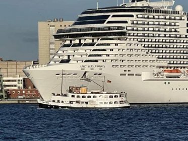 MSC Grandiosa cruise ship leaves Ostuferhafen Kiel on May 14, 2022 | ShipspottingMag.com