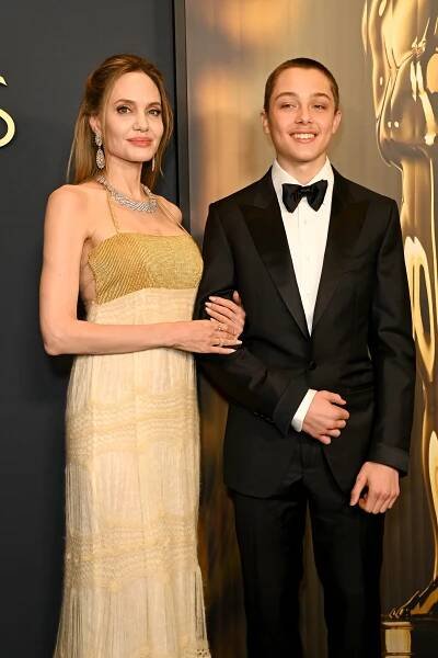 Angelina Jolie Beams With Pride Beside Son Knox in Rare Public Outing