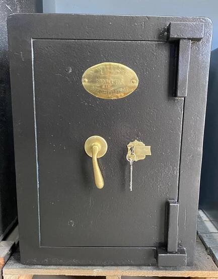 Modern Steel Safe In Home Office Wallpaper