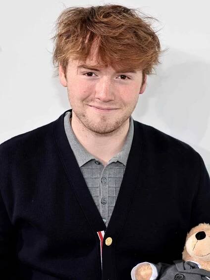 Cooper Hoffman attends the Thom Browne Fall 2022 runway show on April 29, 2022 in New York City