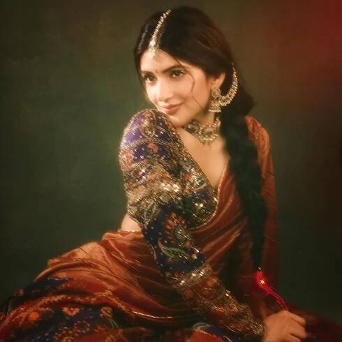 Sreeleela’s multi-hued lehenga is layered with zardozi and tikki handwork