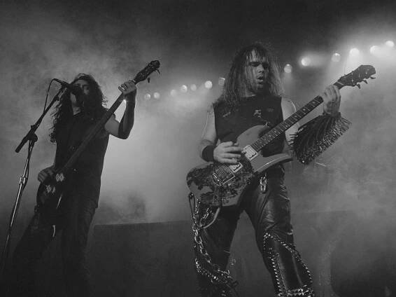 Tom Araya and Jeff Hanneman of Slayer performing in the 1980s, photo by Alison S. Braun/CORBIS via Getty Images