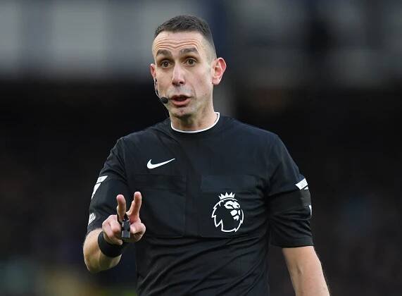 Referee David Coote officiating a Premier League match.