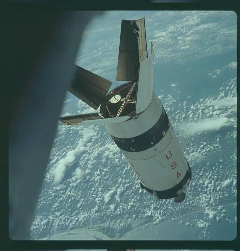 the space shuttle is flying over the earth