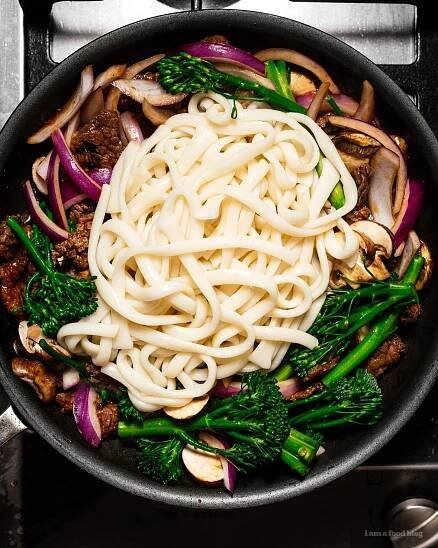 This is a weeknight stir fry udon based on japanese spicy beef that comes together easily and quickly in only 10 minutes. It's spicy, savory, and irresistably delicious. You'll never believe it only has 8 ingredients. #udon #weeknight #stirfry