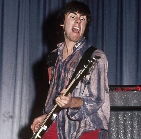 Glen Matlock performs onstage in the Sex Pistols' heyday