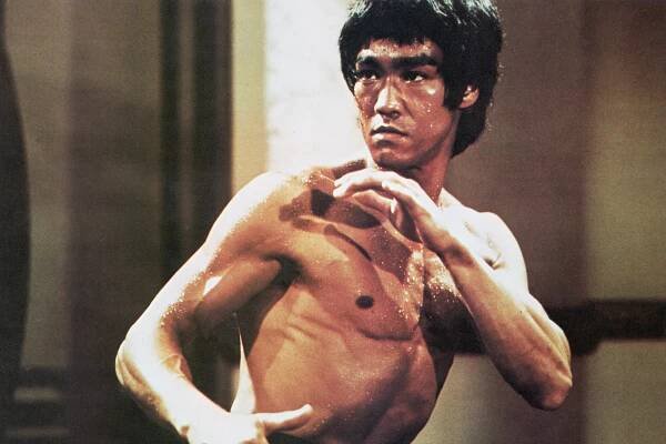 Chinese-American martial arts exponent Bruce Lee in a karate stance, early 1970s.
