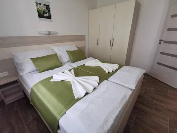 Postel nebo postele na pokoji v ubytování VILLA MEGER