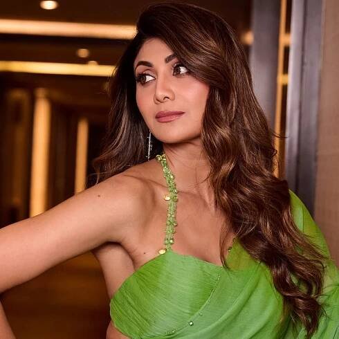 Shilpa Shetty Kundra’s green chiffon sari by Manish Malhotra came with a halter blouse