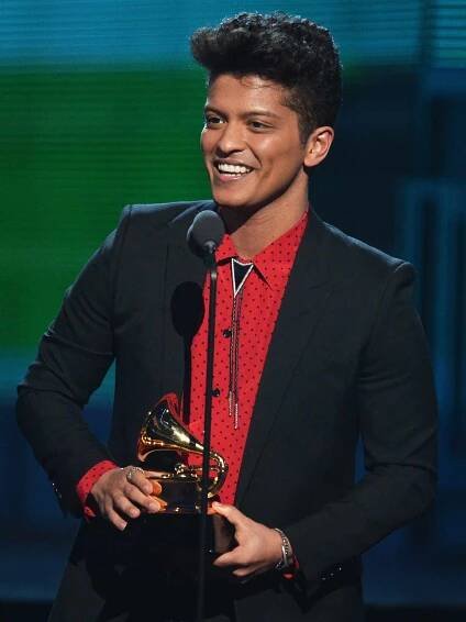 Bruno Mars speaks onstage during the 56th GRAMMY Awards on January 26, 2014 in Los Angeles, California. 