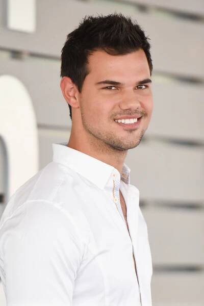 Taylor Lautner Danced the Night Away at "Taylor Swift: The Eras Tour" Movie Screening