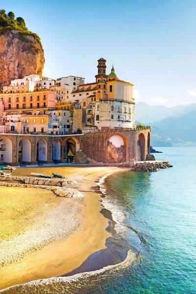 Morning view of Amalfi cityscape on coast line of mediterranean sea, Italy