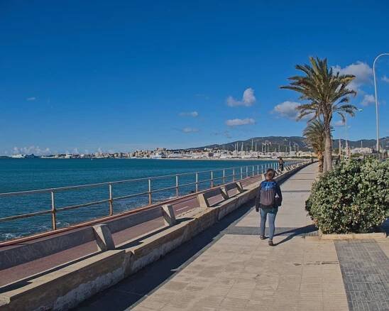 woman walking on the promenade