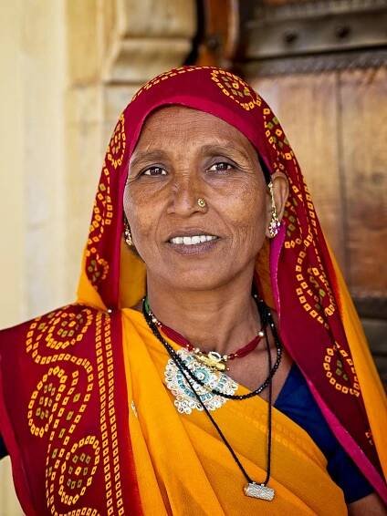 Indian lady at the Amber Palace, Jaipur, India by Sam Davis Professional Travel Portrait Photographer