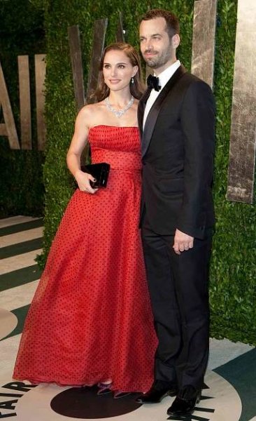 Natalie Portman and husband Benjamin Millepied arrive to the Vanity Fair Oscar Party, for the 84th Annual Academy Awards, at the Sunset Tower on February 26, 2012 in West Hollywood, California