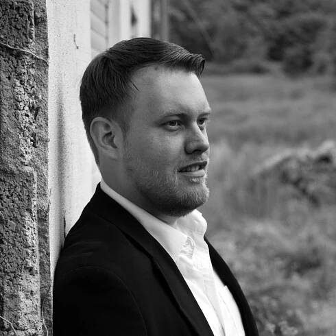 Lars Riedel, Bassbariton und Chorleiter 