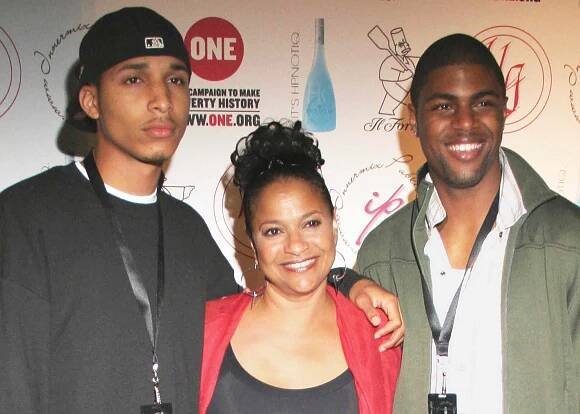 Norm Nixon, Jr., Debbie Allen and DeVaughn Nixon attend Sophisticated Elegant Blacks in Art at Karen Lynne Gallery on July 14, 2005.