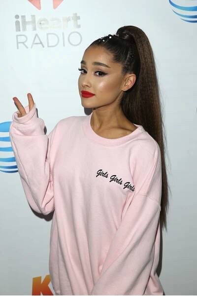Image may contain Clothing Apparel Sleeve Long Sleeve Human Person Face and Hair