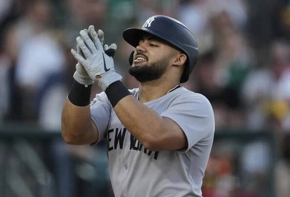 Jasson Dominguez celebrates after belting one of his three homers in the Yankees' blowout win over the A's.