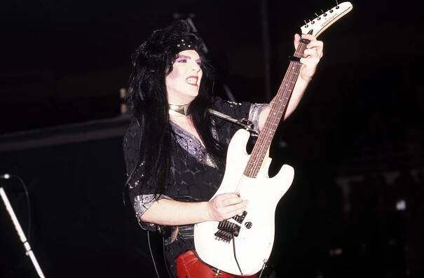 Mick Mars performs onstage with M&ouml;tley Cr&uuml;e at the Joe Louis Arena on September 15, 1985, in Detroit, Michigan