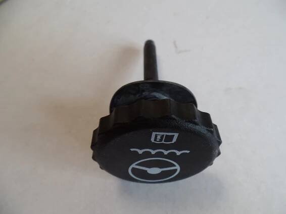 Gage rod cap liquid