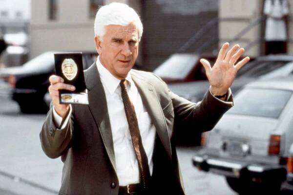 Leslie Nielsen in THE NAKED GUN