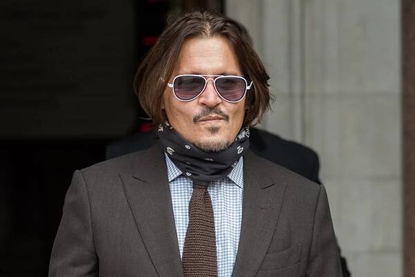 Johnny Depp arrives at court on the seventh day of hearings in his libel case.