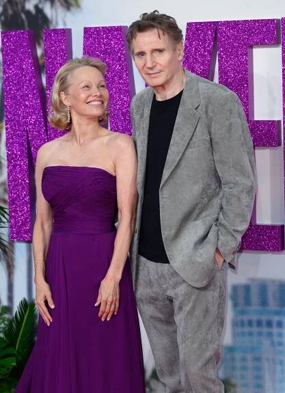 Pamela Anderson and Liam Neeson at "Naked Gun" premiere in July 2025 in London