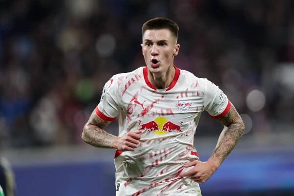 LEIPZIG, GERMANY - 2024/10/02: Benjamin Sesko of RB Leipzig celebrates after scoring a goal during the UEFA Champions League match between RB Leipzig and Juventus at Red Bull Arena. FInal Score; RB Leipzig 2 : 3 Juventus. (Photo by Grzegorz Wajda/SOPA Images/LightRocket via Getty Images)