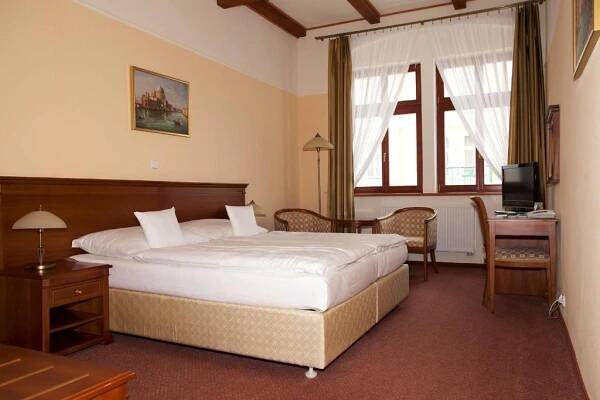 Posteľ alebo postele v izbe v ubytovaní Wellness Hotel Ida
