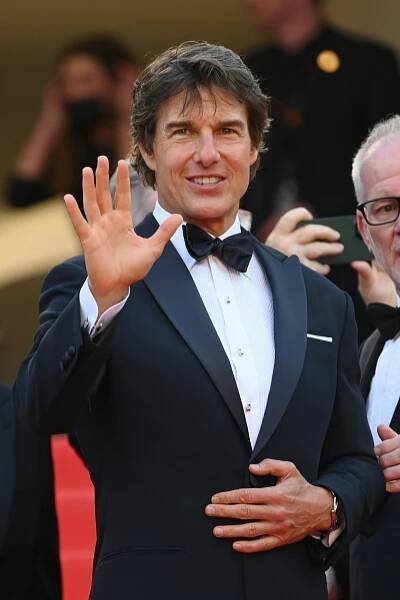 bestof topix cannes formal wear suit tie glasses person fashion wristwatch tuxedo head face
