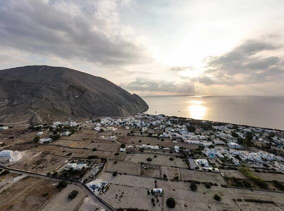 Perissa Beach: Santorini’s Iconic Black Sand Paradise with History and Vibrance