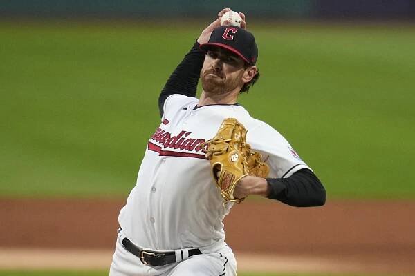 Cleveland Guardians' Shane Bieber pitches to a Baltimore Orioles batter during the first inning of a baseball game Friday, Sept. 22, 2023, in Cleveland.
