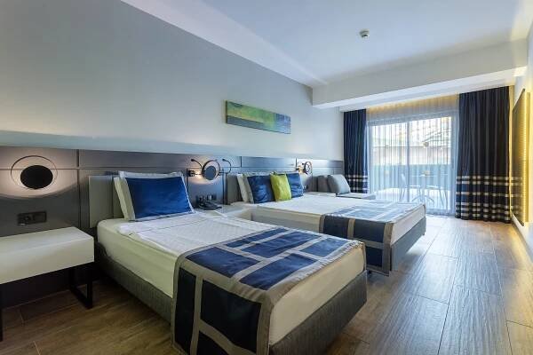 Postel nebo postele na pokoji v ubytování Noxinn Deluxe Hotel - Ultra All Inclusive