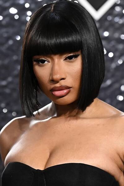 Megan Thee Stallion Thought Out Every Last Detail of Her Starfire Costume—See the Photos