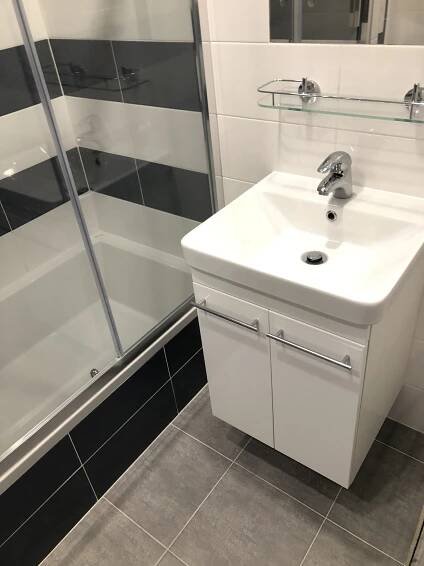 Rekonstrukce bytového jádra bytu 1KK,obklad UP | Skála - koupelny na klíč