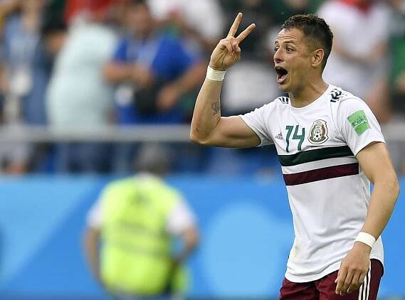 Javier Hernandez celebrates scoring a goal.