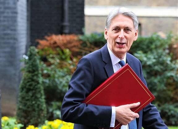‘What is he Doing for his Wage?’: Lord Philip Hammond’s Revolving Door Continues