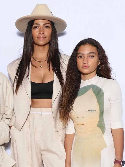 Camila Alves McConaughey (C) with son Levi Alves McConaughey (L) and daughter Vida Alves McConaughey (R) attend the Stella McCartney Womenswear Fall Winter 2023-2024 show as part of Paris Fashion Week on March 06, 2023 in Paris, France