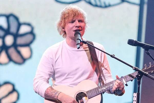 Ed Sheeran gets shut down by cops while performing 'Shape of You' on the street in India