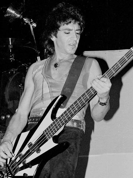Alec John Such of the hard rock group "Bon Jovi" performs onstage in 1984 in Los Angeles, California.